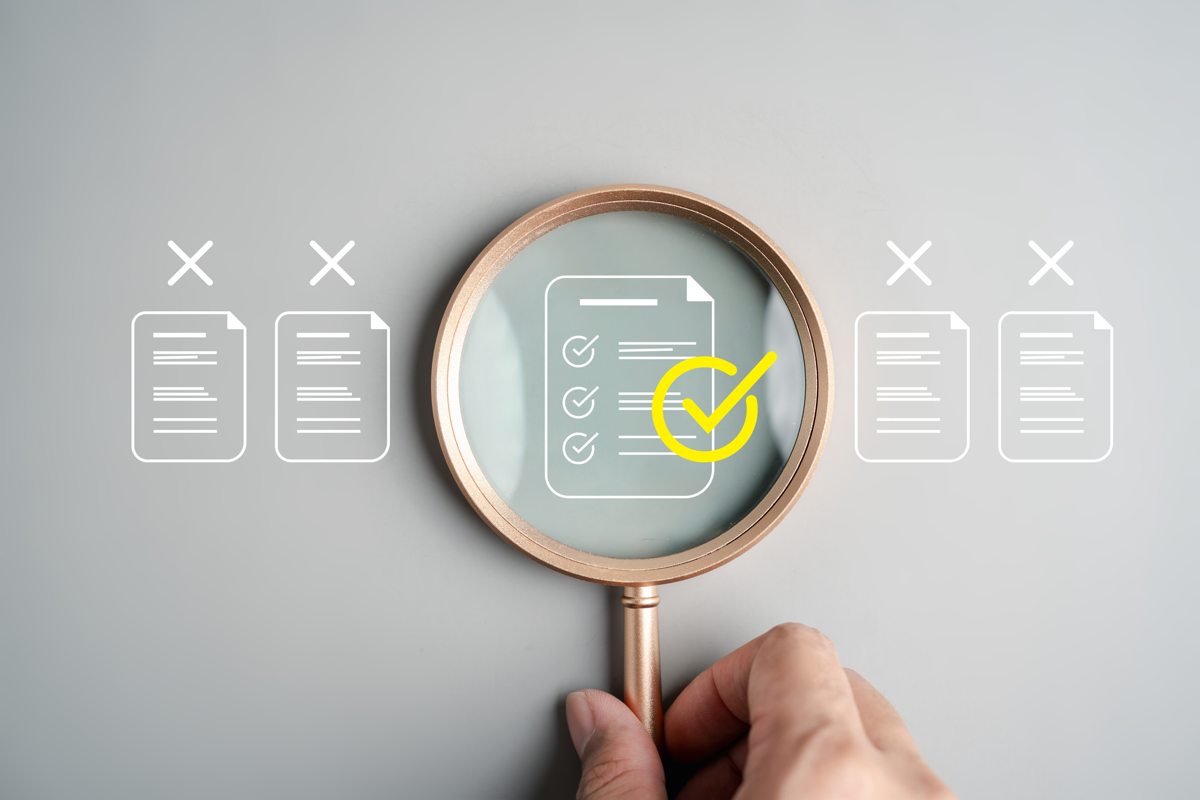 A magnifying glass highlights a checked document among application records.